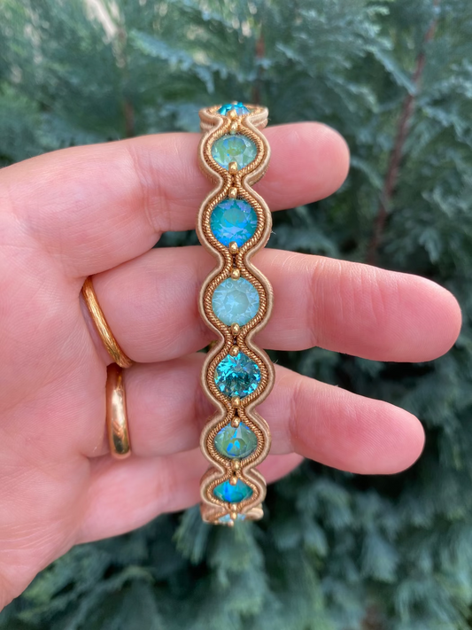 Bracciale con Swarovski toni oro e azzurro acqua